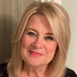 Headshot Of Caroline Gibbons